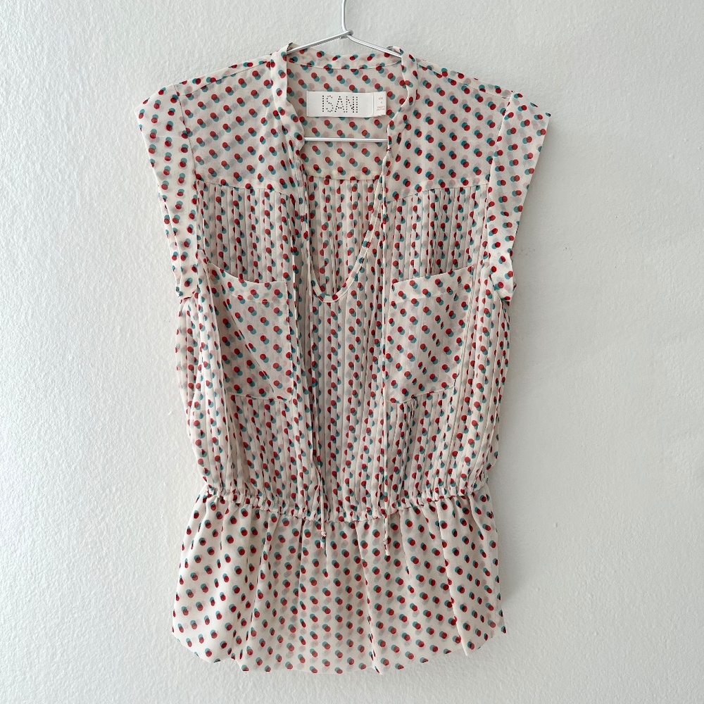 Anthropologie cap sleeve, pleated peplum blouse from the brand ISANI. Size 4.